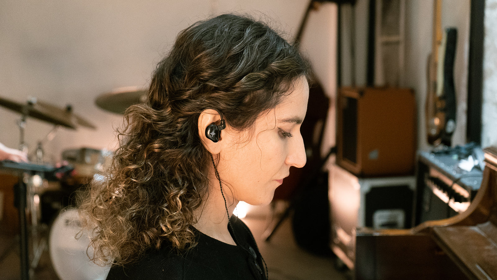 Singer wearing soundbrenner wave in-ear monitors