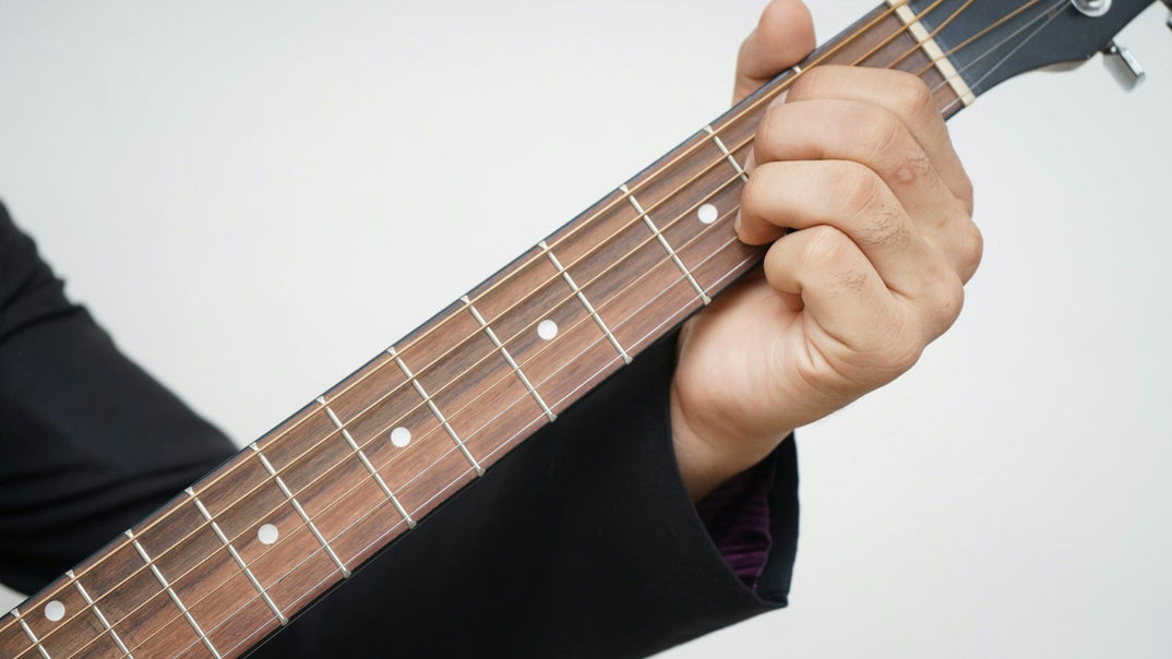 Fret buzz on acoustic guitars: how to fix it (7 solutions)