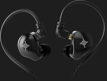 Pair of black in-ear monitors with attached cables on a dark background