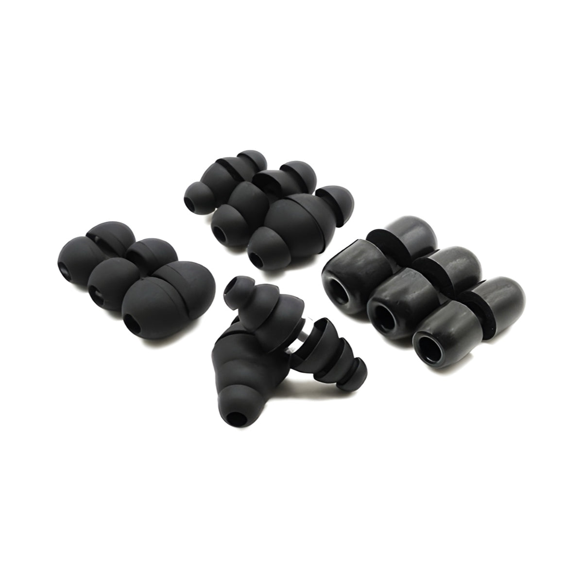 Black Minuendo ear tips in several shapes arranged on a white background