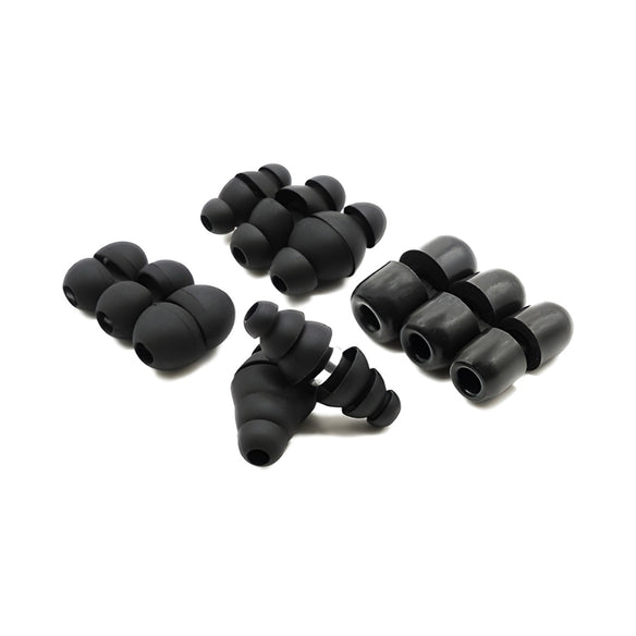 Black Minuendo ear tips in several shapes arranged on a white background