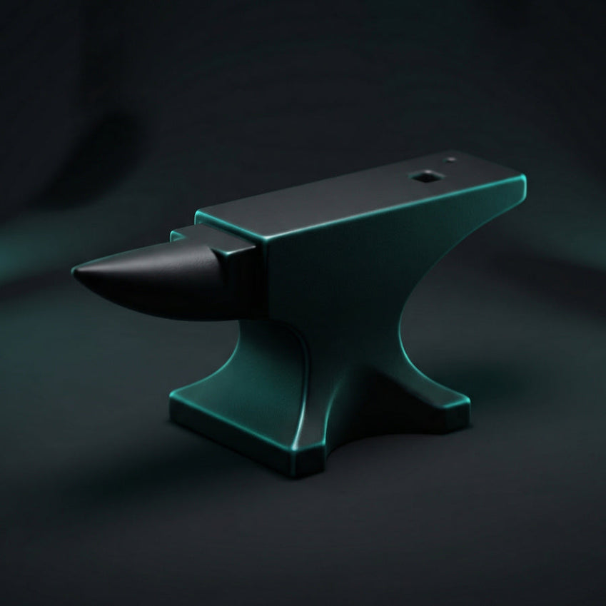 Dark metal anvil on a black background
