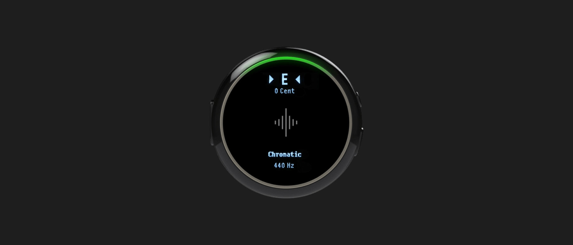 Round practice device showing an E note, 1 cent, and chromatic tuner information