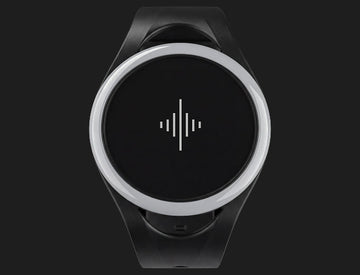Black Pulse wearable metronome shown from the front on a dark background