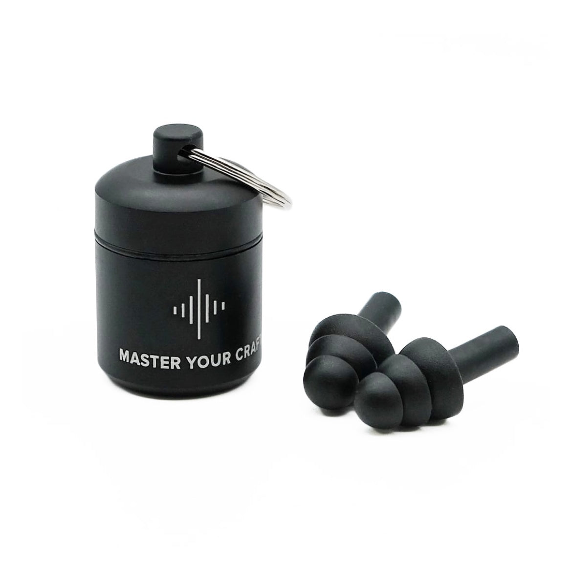 Black foam earplugs beside a keychain case labeled Master Your Craft