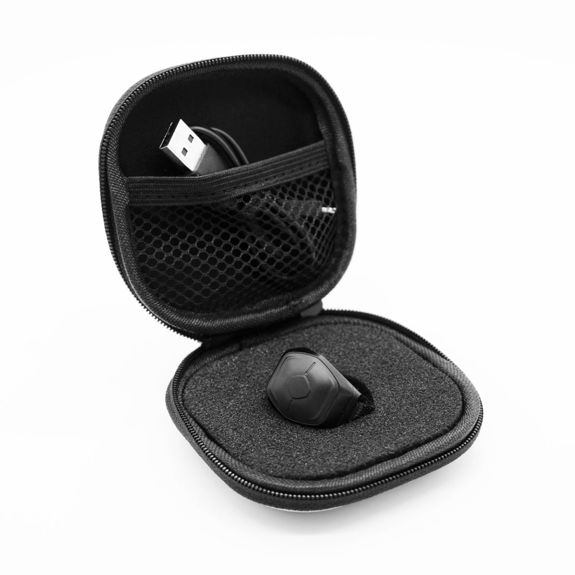 Open carrying case containing a black MIDI ring and a USB cable