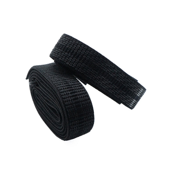 Rolled black Core body strap with one end unrolled