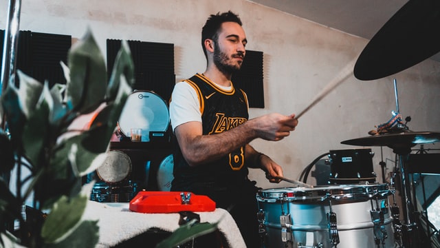 Soundbrenner | A drummer doing a recording